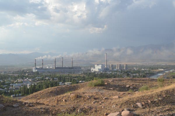 Carbon Dioxide emitted by factories.